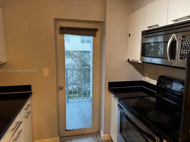 an empty room with cabinet