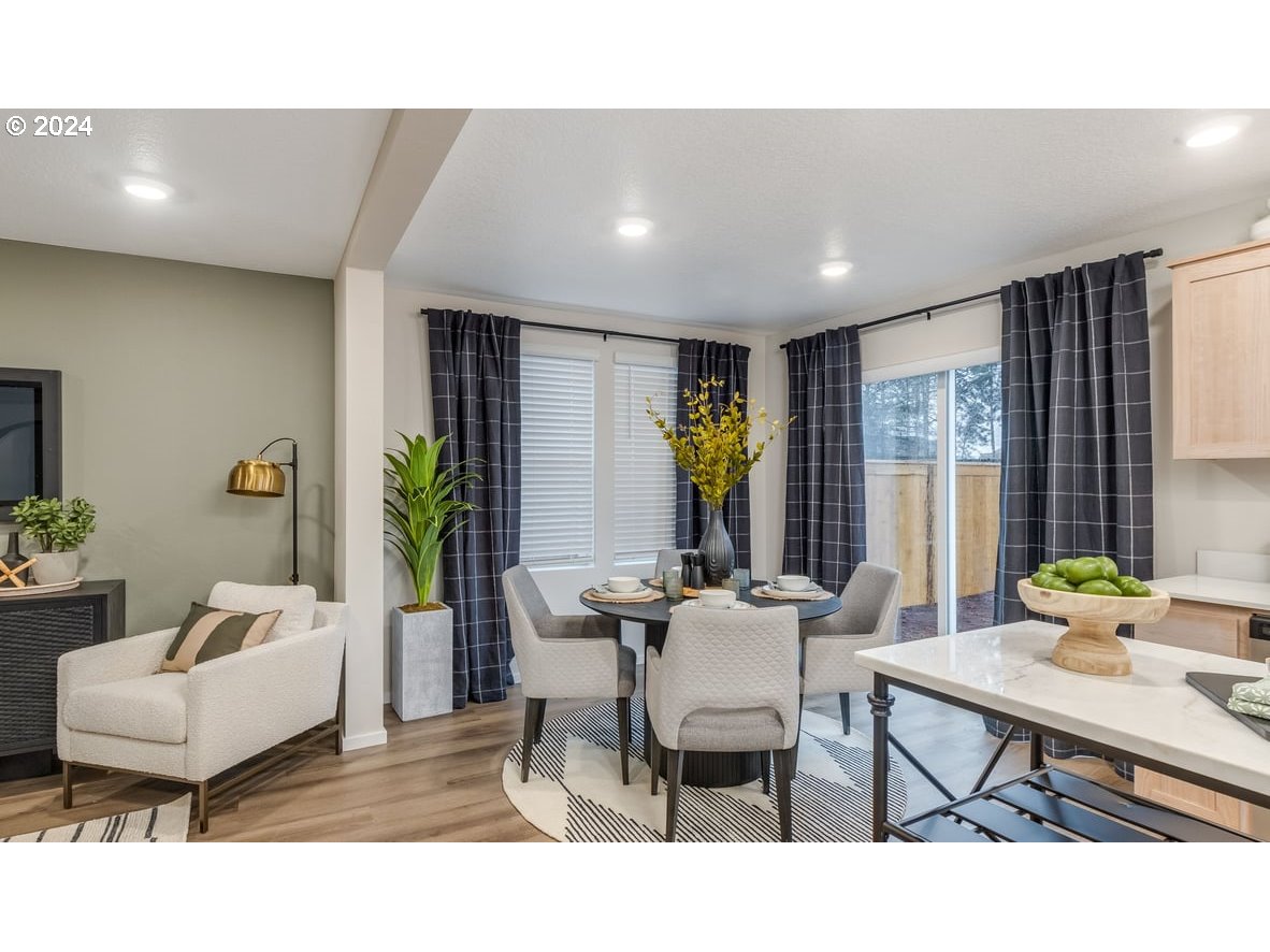 1555 Southeast Pheasant Avenue Gresham, OR 97080 - Photo 10 of 32 a living room with furniture and window