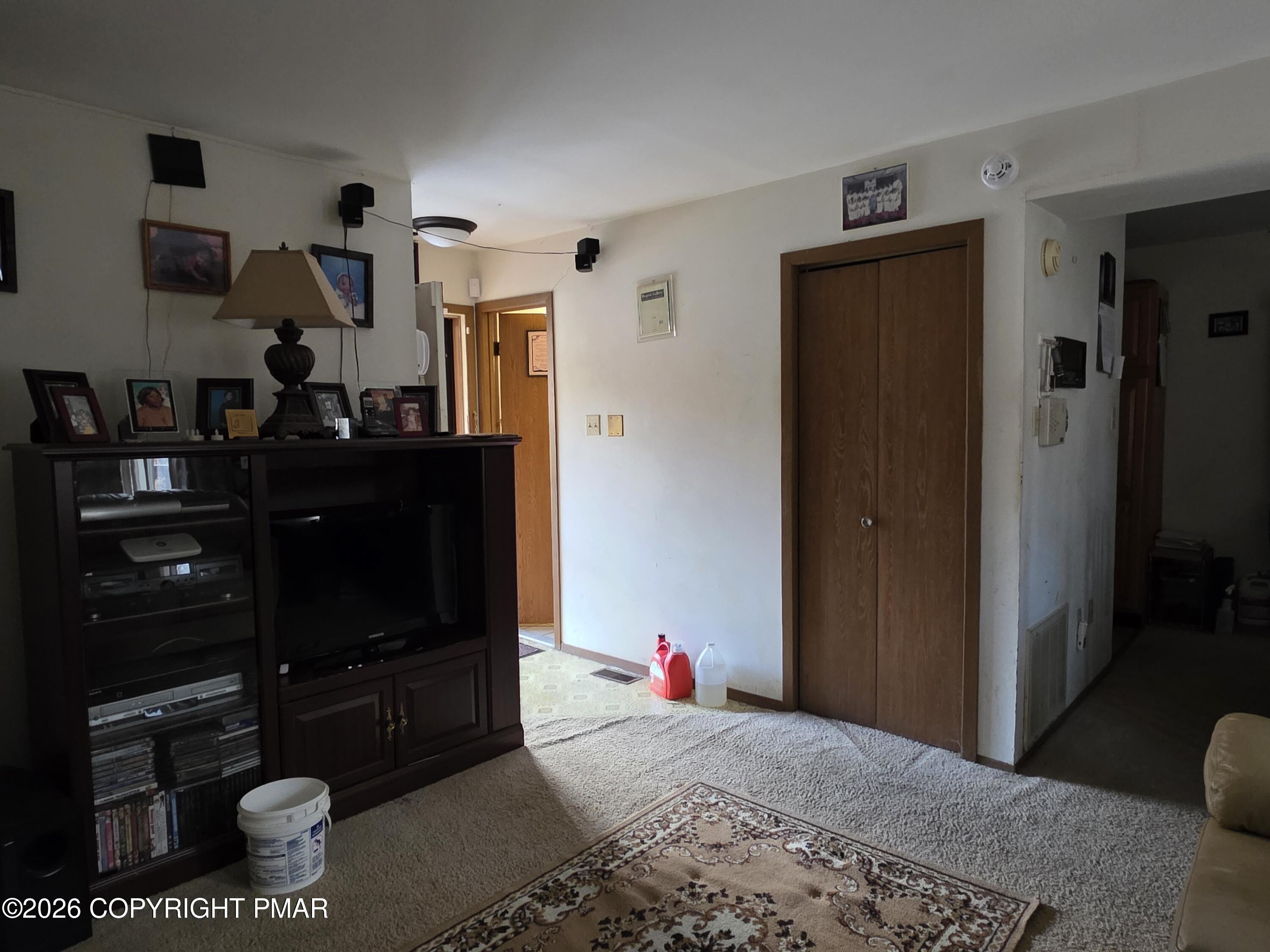 503 English Court Bushkill, PA 18324 - Photo 4 of 14 a bedroom with a bed and a dresser