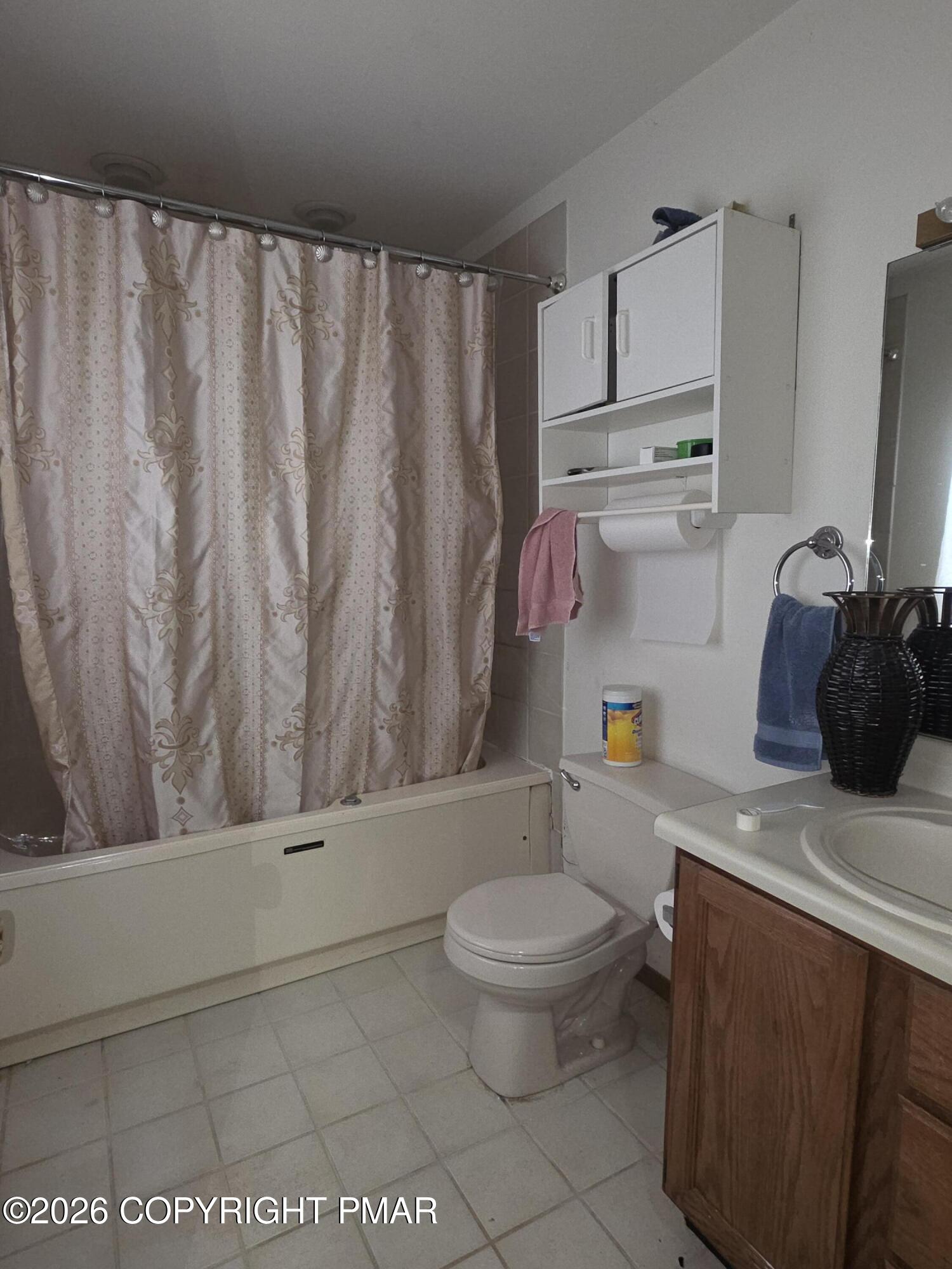 503 English Court Bushkill, PA 18324 - Photo 9 of 14 a bathroom with a granite countertop bathtub sink vanity and toilet