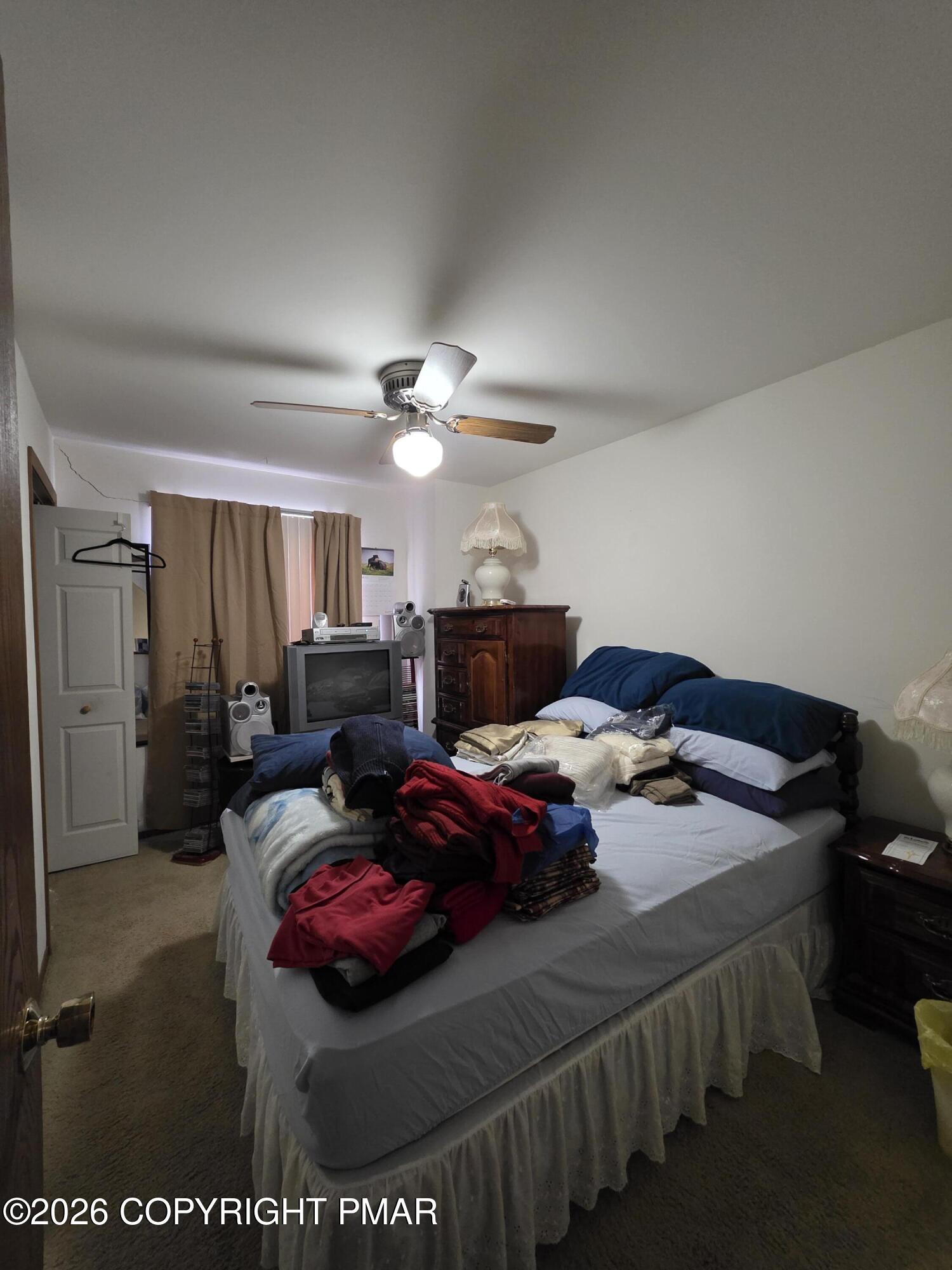 503 English Court Bushkill, PA 18324 - Photo 10 of 14 a bedroom with bed and window