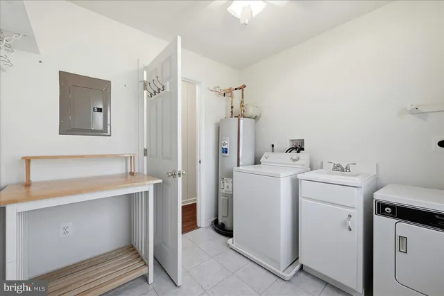 a backyard of apartments with large trees