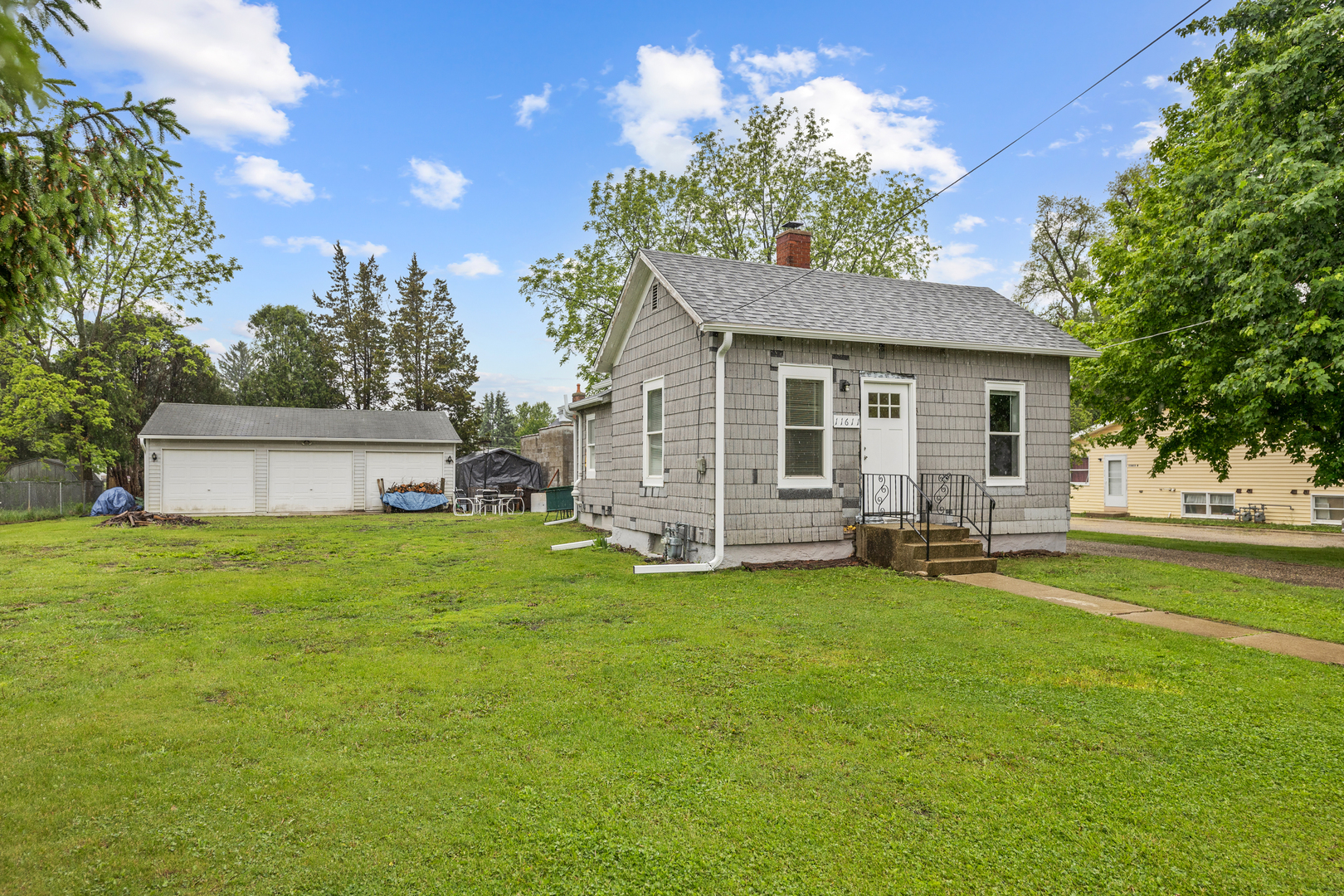 11611 Maple Avenue Hebron, IL 60034 - Photo 3 of 23 a view of a house with a yard