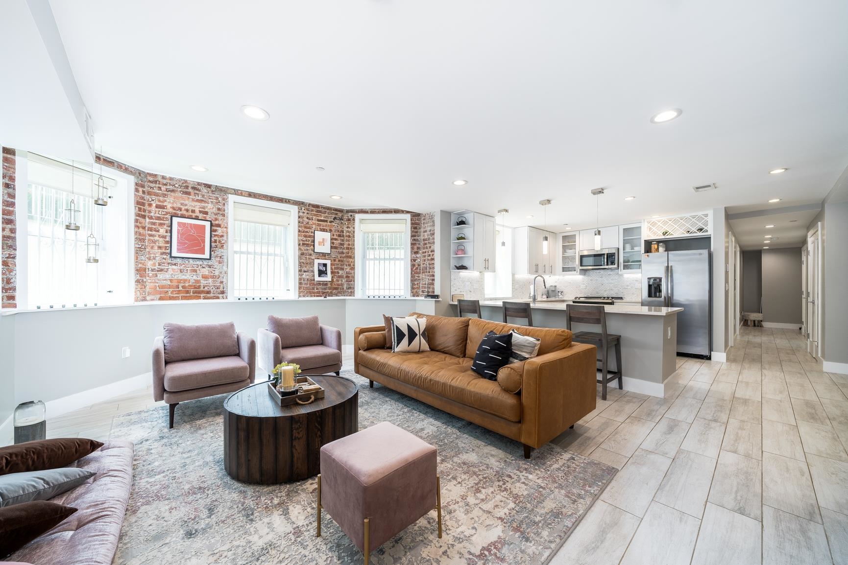 126 Delaware Avenue, Unit 2 Jersey City, NJ 07306 - Photo 1 of 31 a living room with furniture and a view of kitchen