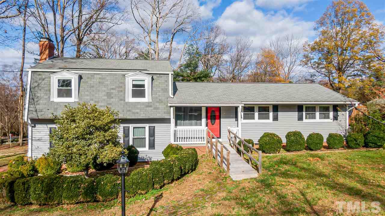 664 Semora Road Roxboro, NC 27573 - Photo 1 of 13 a front view of a house with a yard