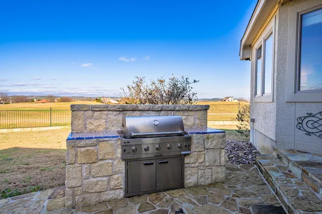 a view of a kitchen with a sink