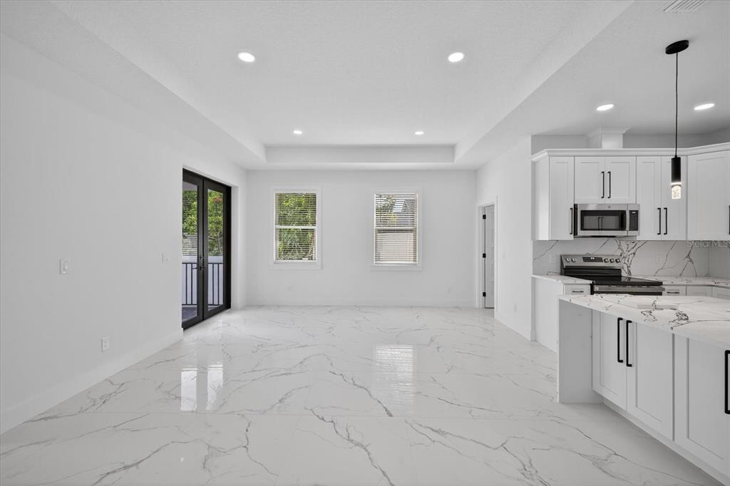 2719 West St John Street Tampa, FL 33607 - Photo 20 of 44 a view of a kitchen with electric appliances