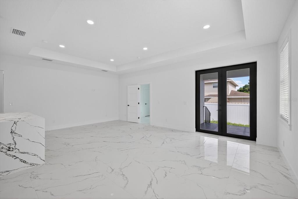 2719 West St John Street Tampa, FL 33607 - Photo 23 of 44 a view of an empty room with a window