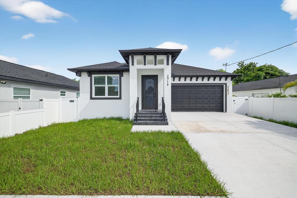2719 West St John Street Tampa, FL 33607 - Photo 4 of 44 a front view of house with yard
