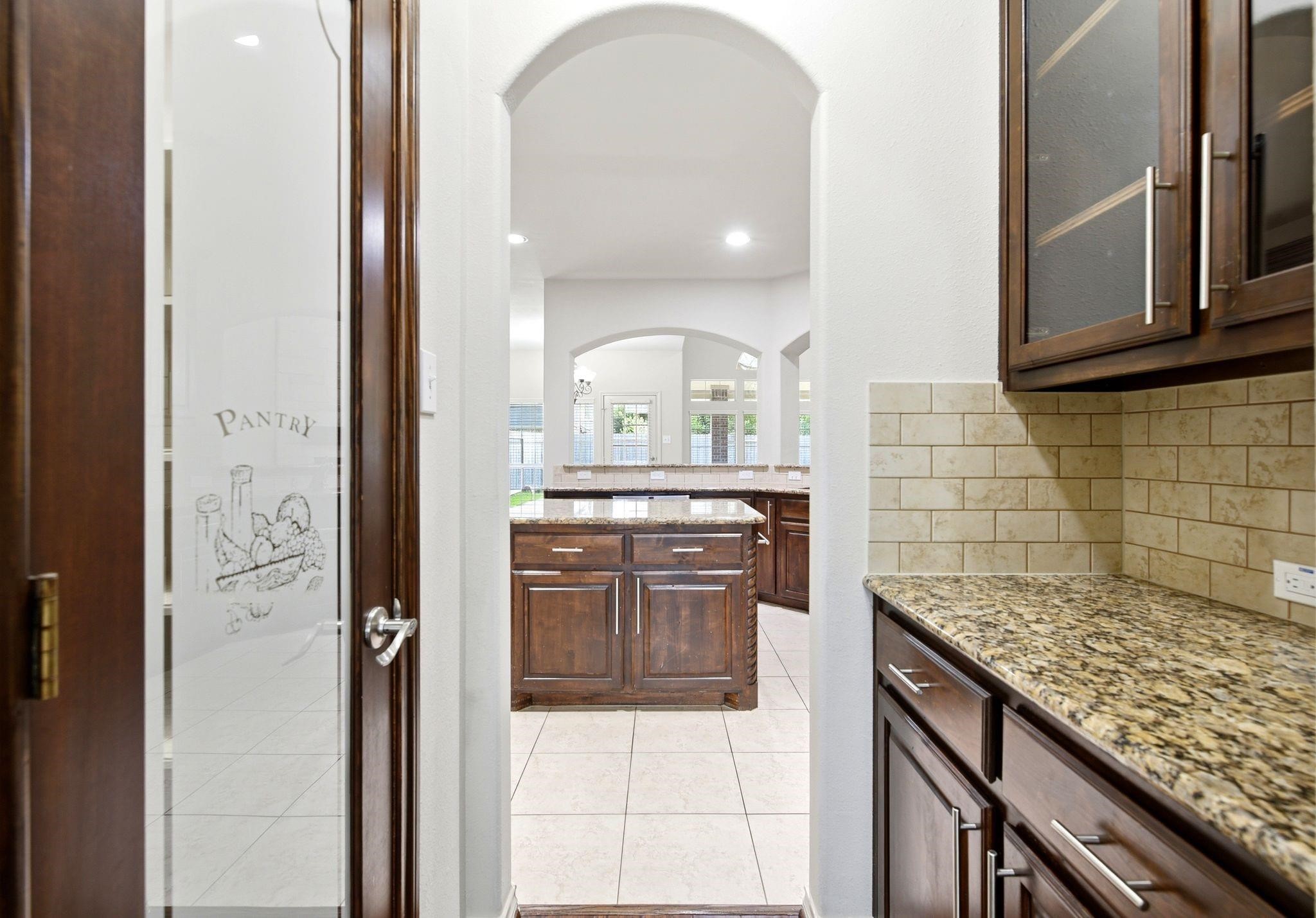 19903 Senterra Lakes Boulevard Spring, TX 77379 - Photo 16 of 50 Butler pantry area off the kitchen and dining room makes this space perfect for entertaining.