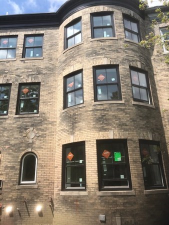 43 Addington Road, Unit 3 Brookline, MA 02445 - Photo 3 of 24 a front view of a brick house with a door