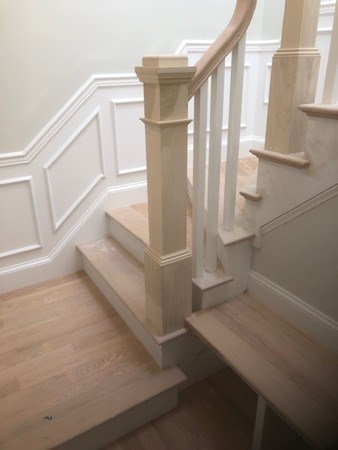 43 Addington Road, Unit 3 Brookline, MA 02445 - Photo 6 of 24 a view of entryway and hall with wooden floor