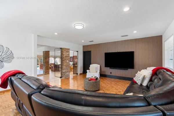a view of a backyard with a tub and wooden floor