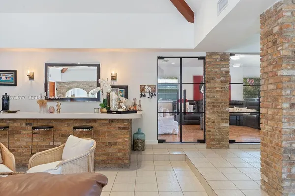 a living room with furniture and a window
