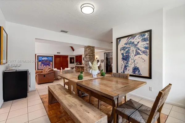 an aerial view of a house with a garden