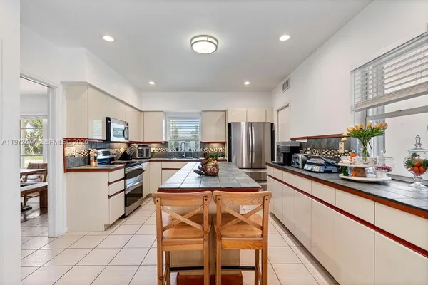 an aerial view of a city with lots of residential buildings