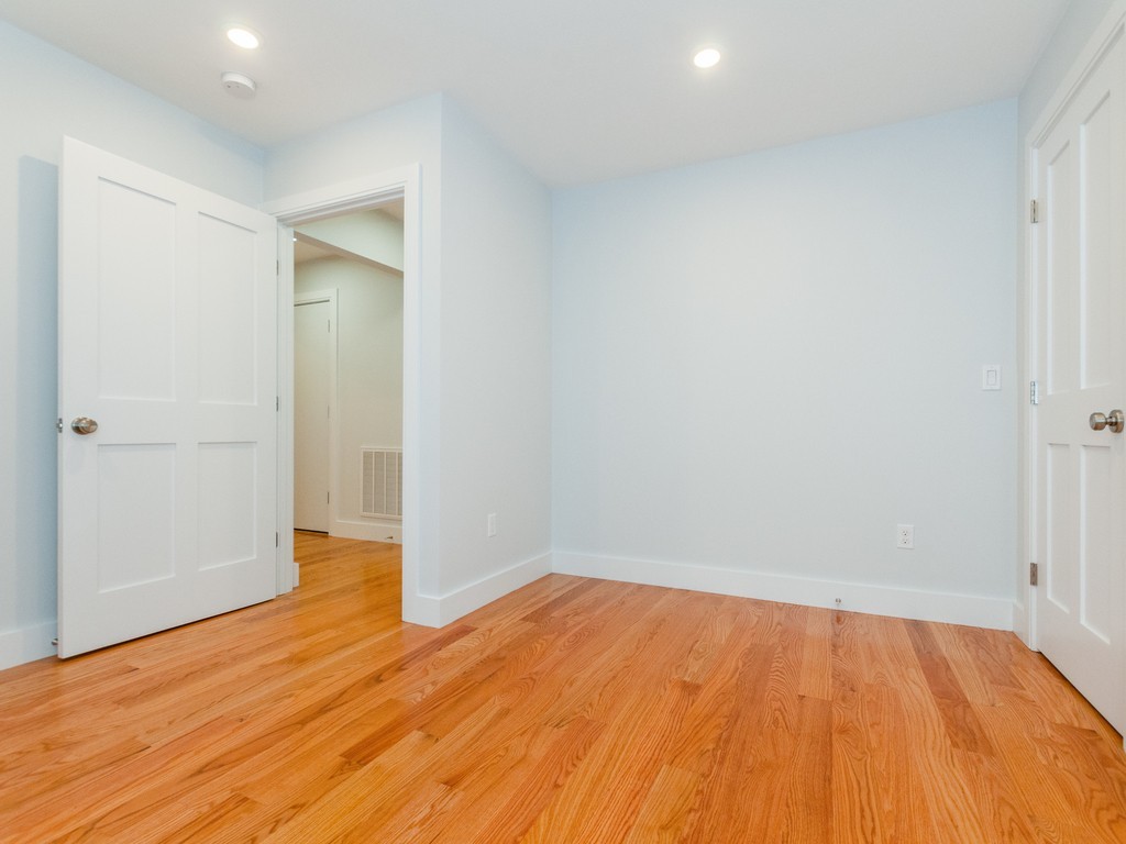 59 Bradford Road, Unit 2 Watertown, MA 02472 - Photo 15 of 20 wooden floor in an empty room