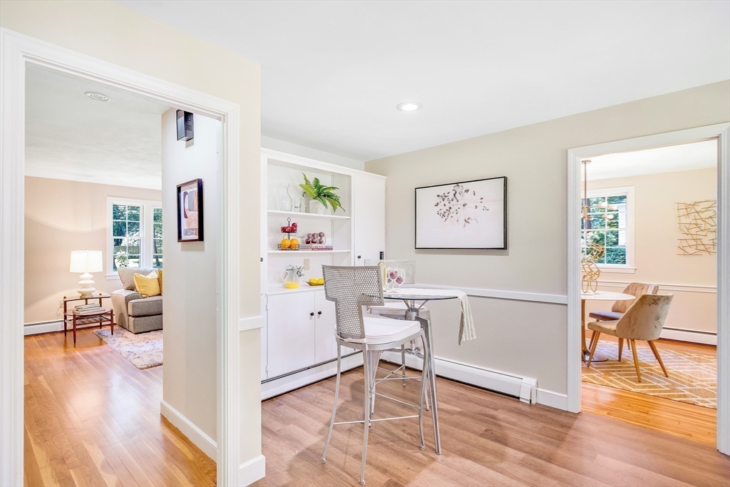 310 Hayward Mill Road Concord, MA 01742 - Photo 11 of 39 a view of a livingroom with furniture and wooden floor