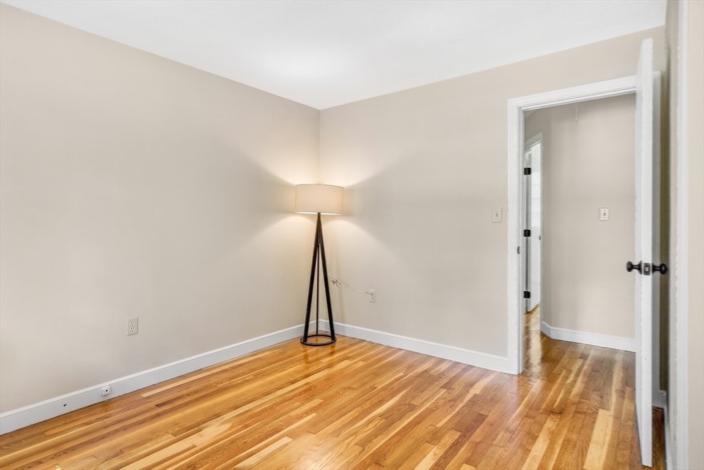 310 Hayward Mill Road Concord, MA 01742 - Photo 29 of 39 a view of empty room with wooden floor