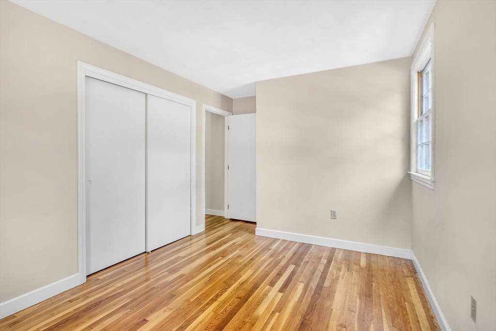 310 Hayward Mill Road Concord, MA 01742 - Photo 31 of 39 a view of a room with wooden floor