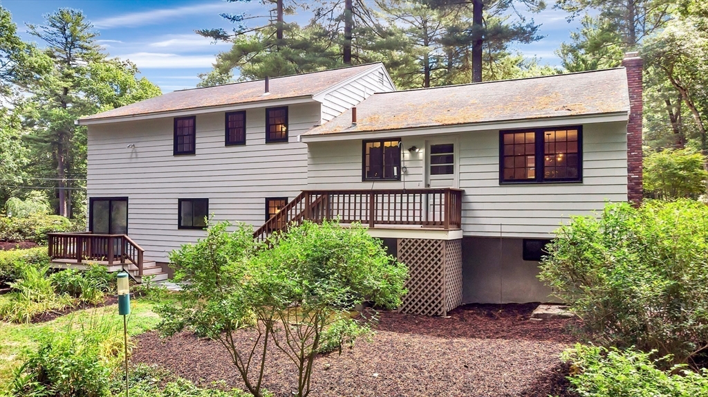310 Hayward Mill Road Concord, MA 01742 - Photo 37 of 39 a front view of a house with garden