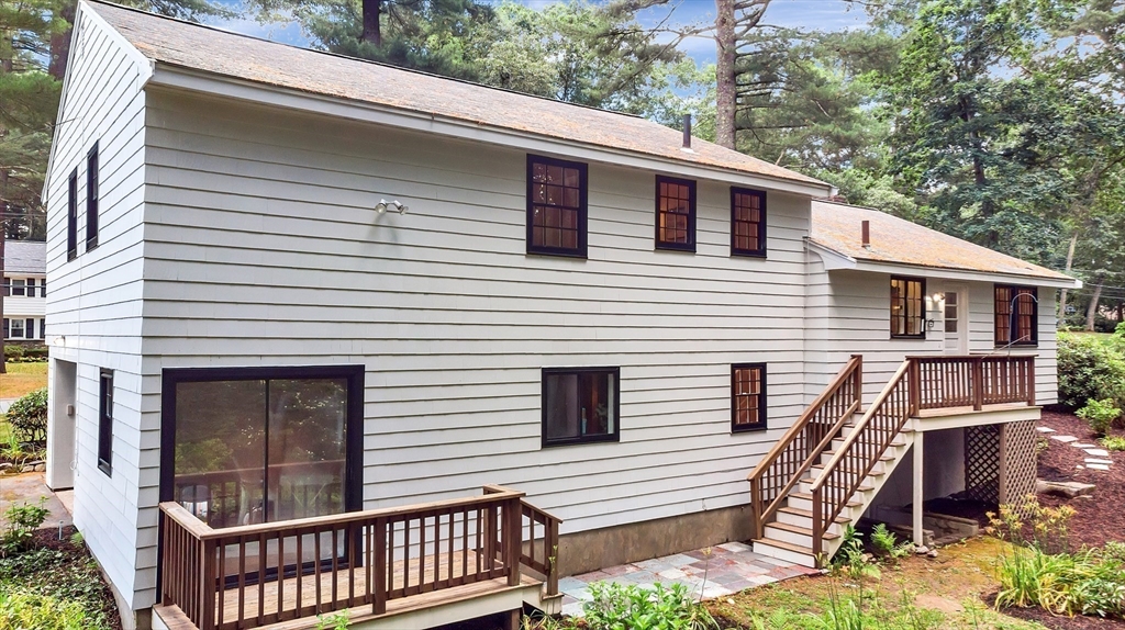 310 Hayward Mill Road Concord, MA 01742 - Photo 39 of 39 a view of a house with a balcony and furniture