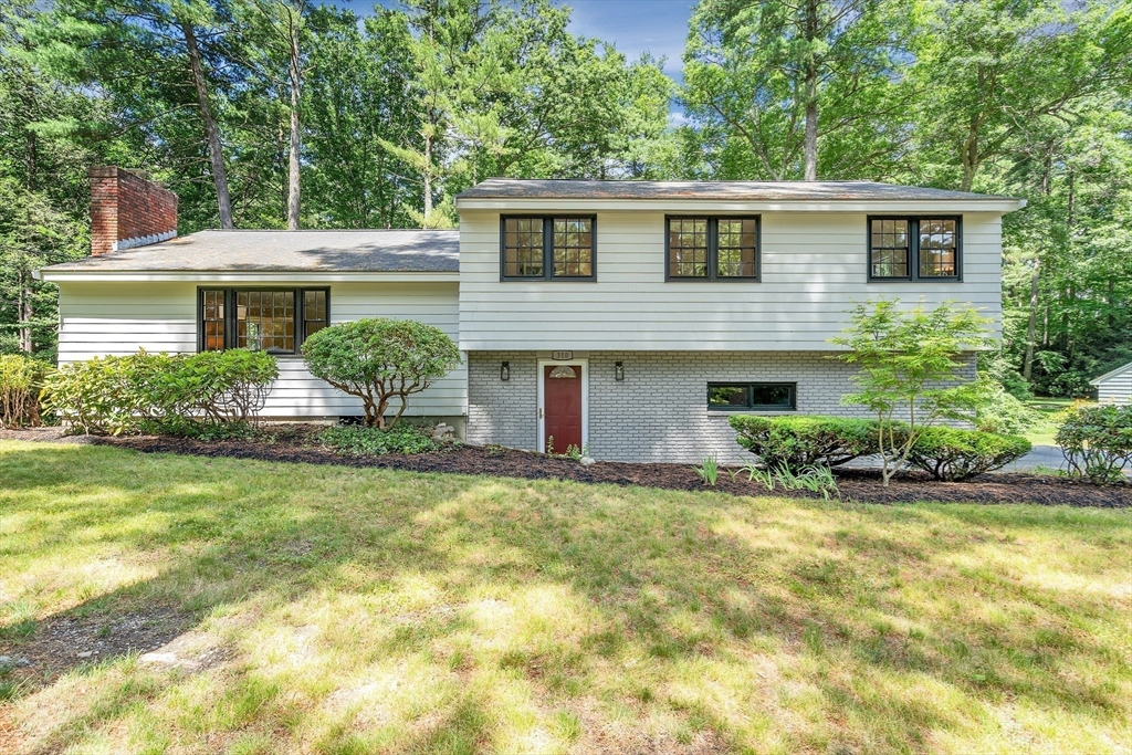 310 Hayward Mill Road Concord, MA 01742 - Photo 4 of 39 front view of a house with a yard
