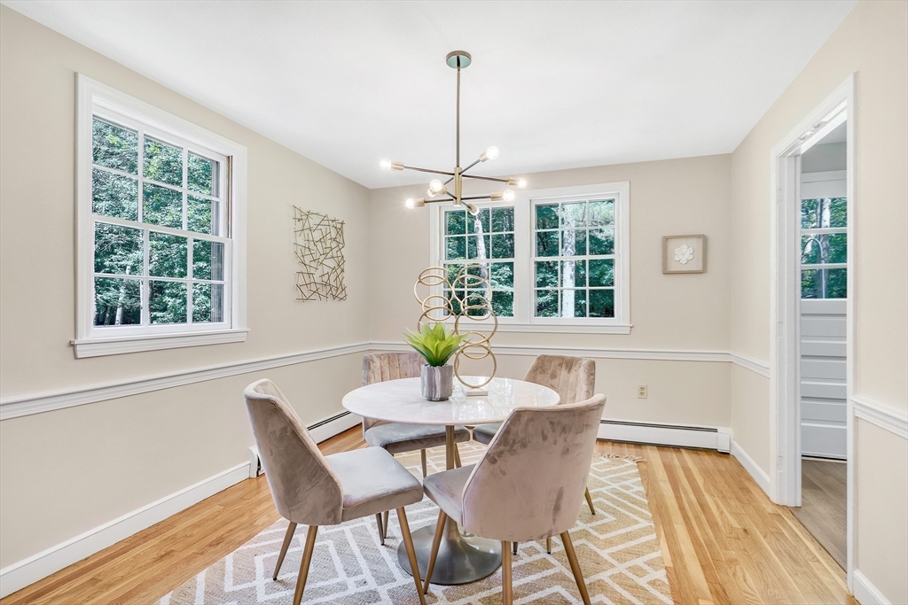 310 Hayward Mill Road Concord, MA 01742 - Photo 8 of 39 a view of a dining room with furniture window and outside view