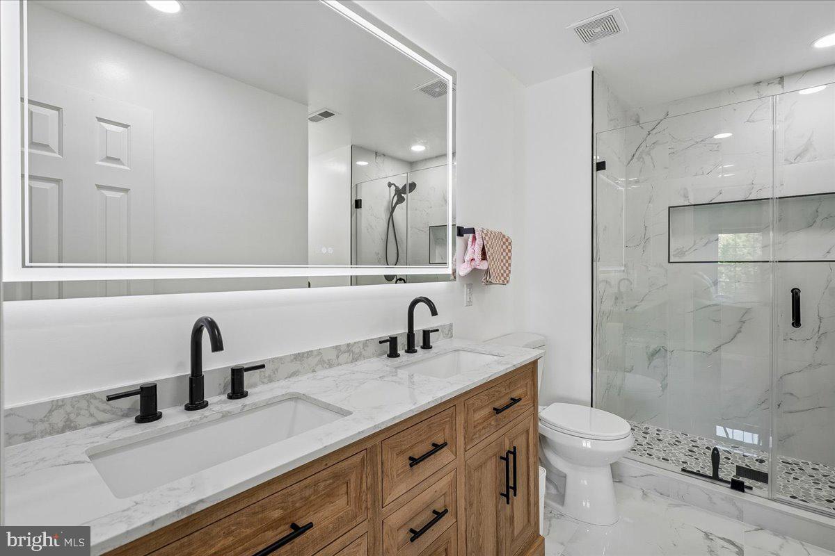 100 Rugby Fredericksburg, VA 22406 - Photo 33 of 41 Sleek modern bathroom oasis.
