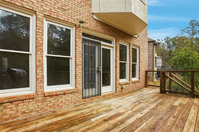 a view of a swimming pool with a yard