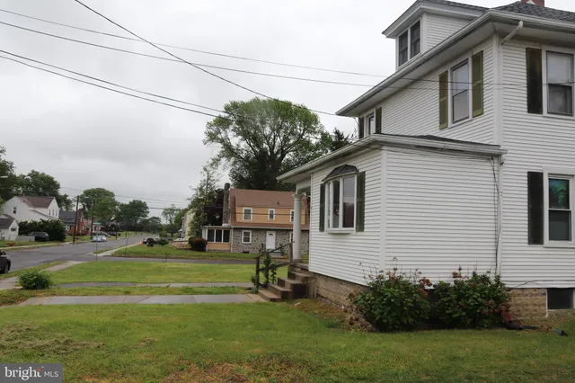 a house view with a garden space