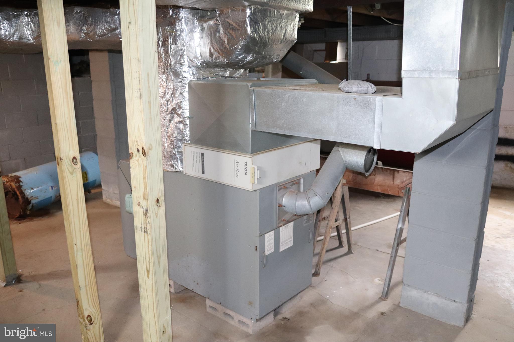 200 Union Street Salem, NJ 08079 - Photo 18 of 26 a view of living room with furniture and a chandelier