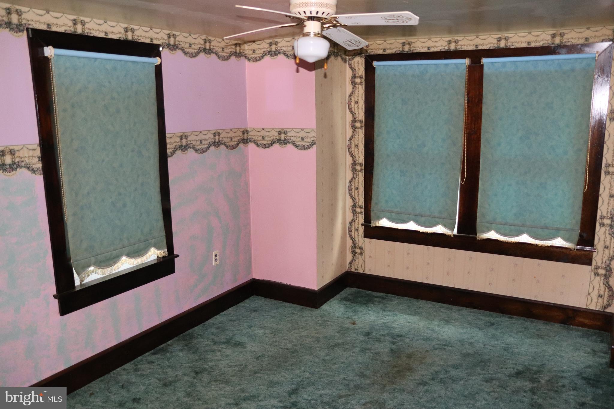 200 Union Street Salem, NJ 08079 - Photo 23 of 26 a view of a small space with wooden floor and a window