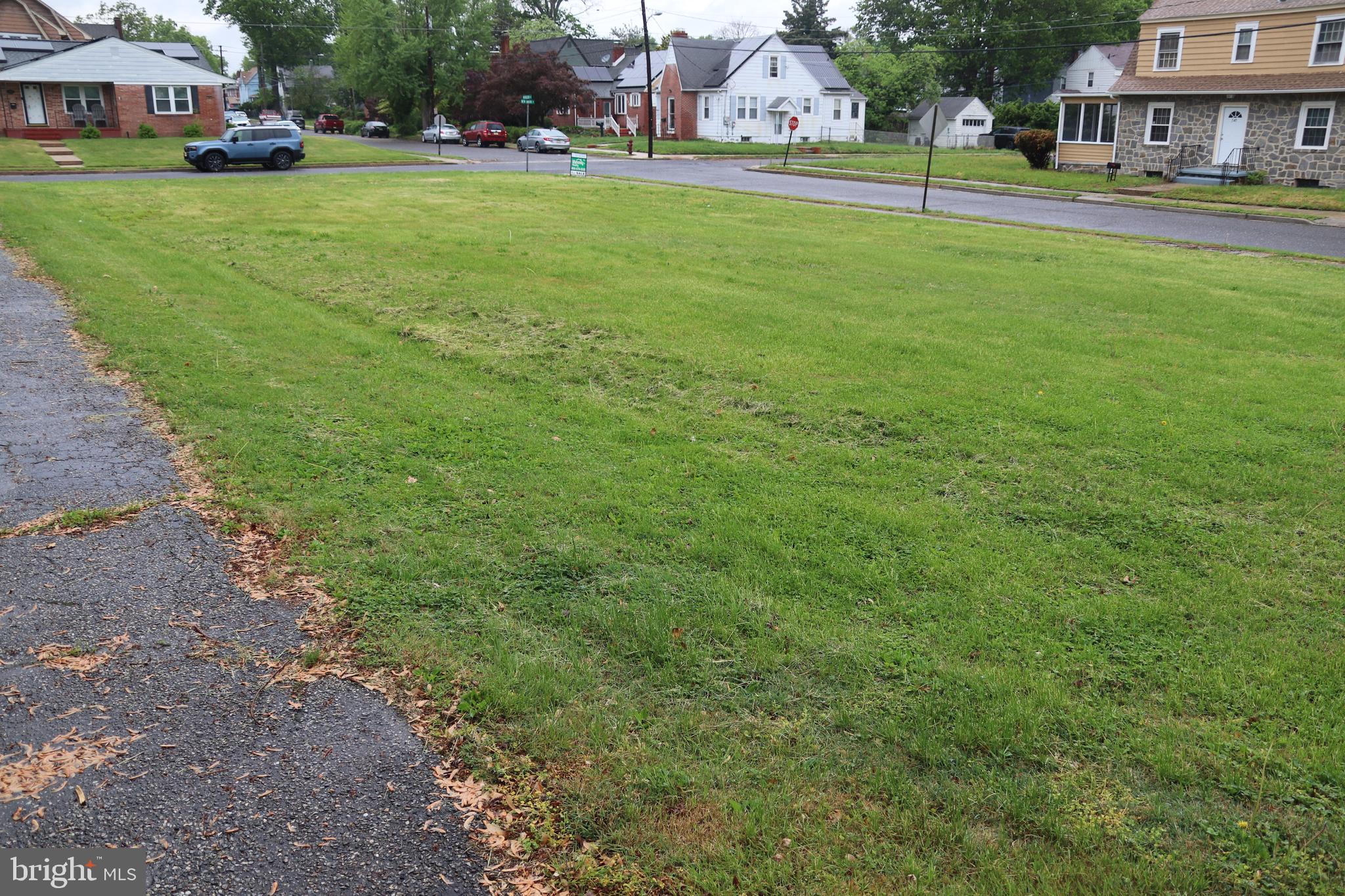200 Union Street Salem, NJ 08079 - Photo 5 of 26 a view of building with garden and tall trees