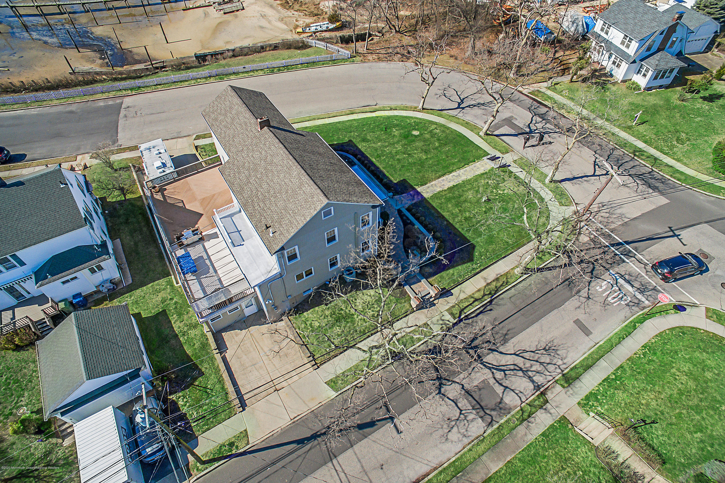 35 Boston Road Neptune City, NJ 07753 - Photo 13 of 30 an aerial view of a house with a yard and lake view