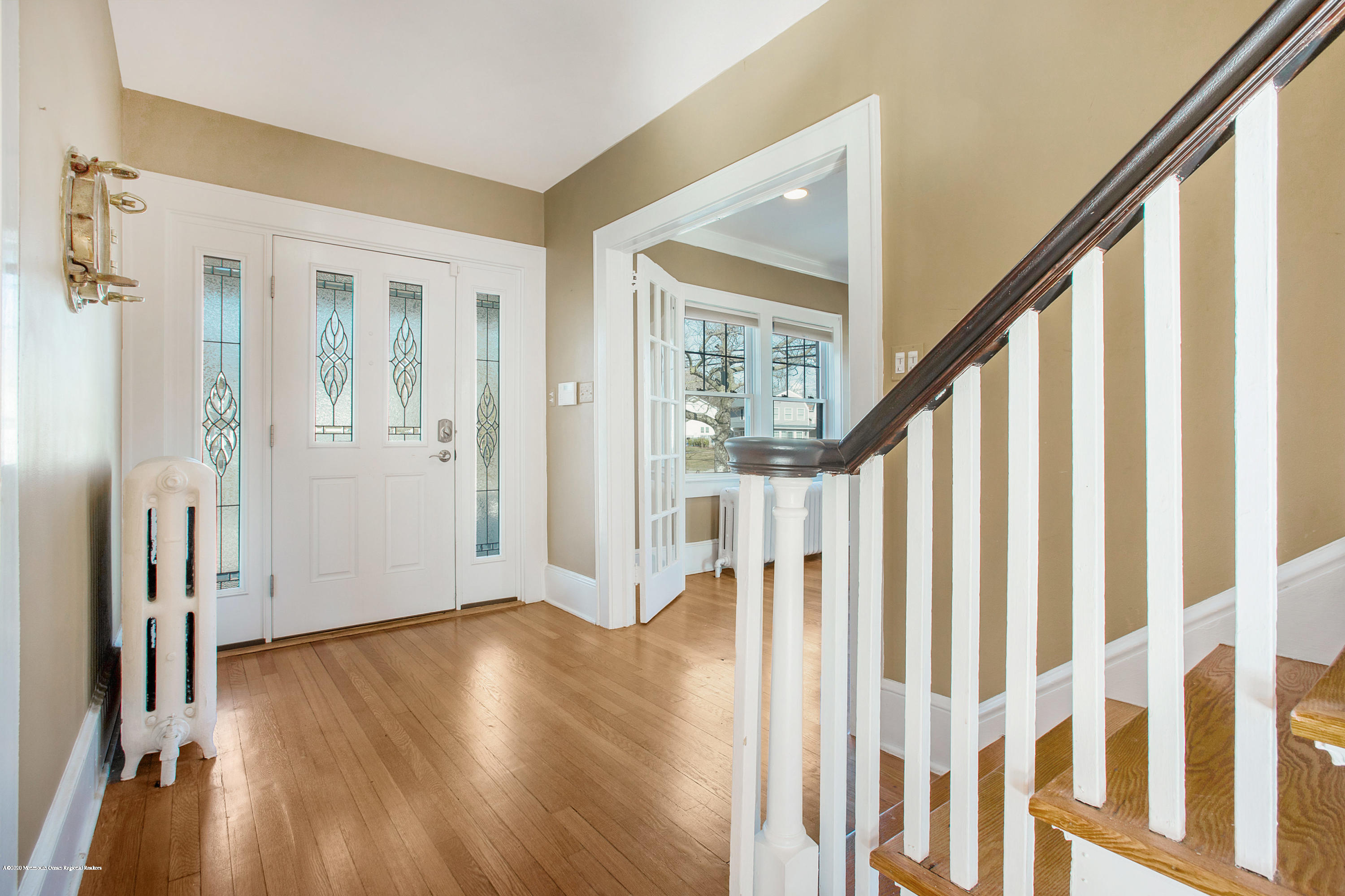 35 Boston Road Neptune City, NJ 07753 - Photo 16 of 30 a view of an entryway with wooden floor and door