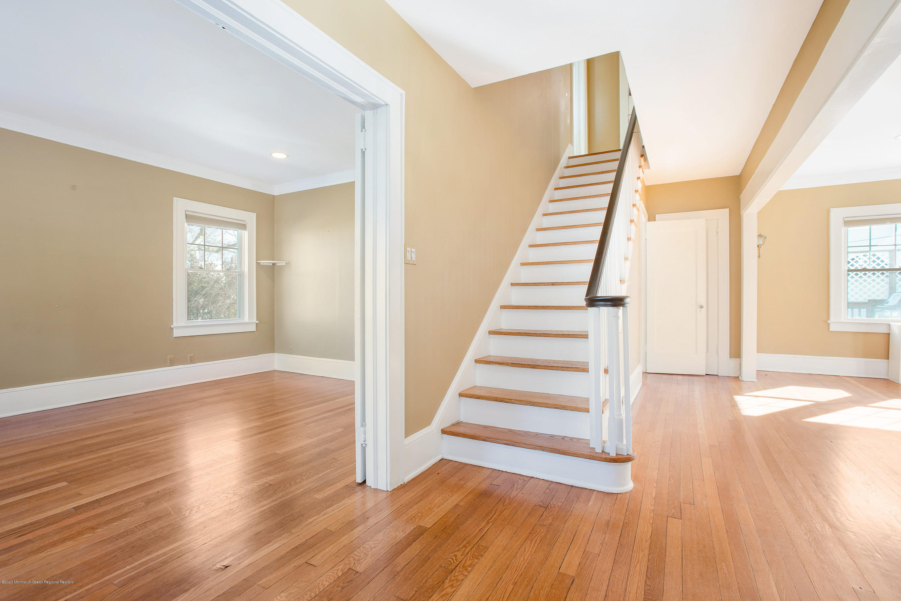 35 Boston Road Neptune City, NJ 07753 - Photo 17 of 30 a view of a room with wooden floors and stairs
