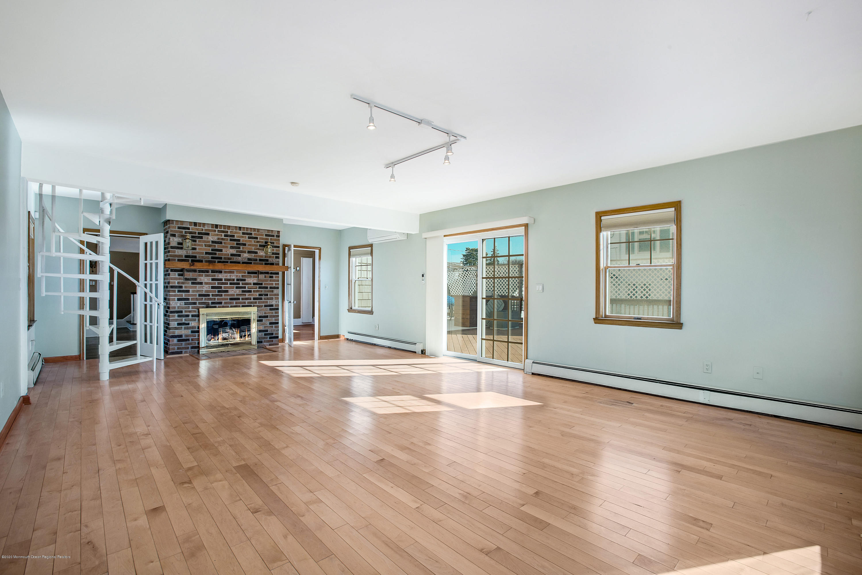 35 Boston Road Neptune City, NJ 07753 - Photo 19 of 30 a view of livingroom with hardwood floor and window