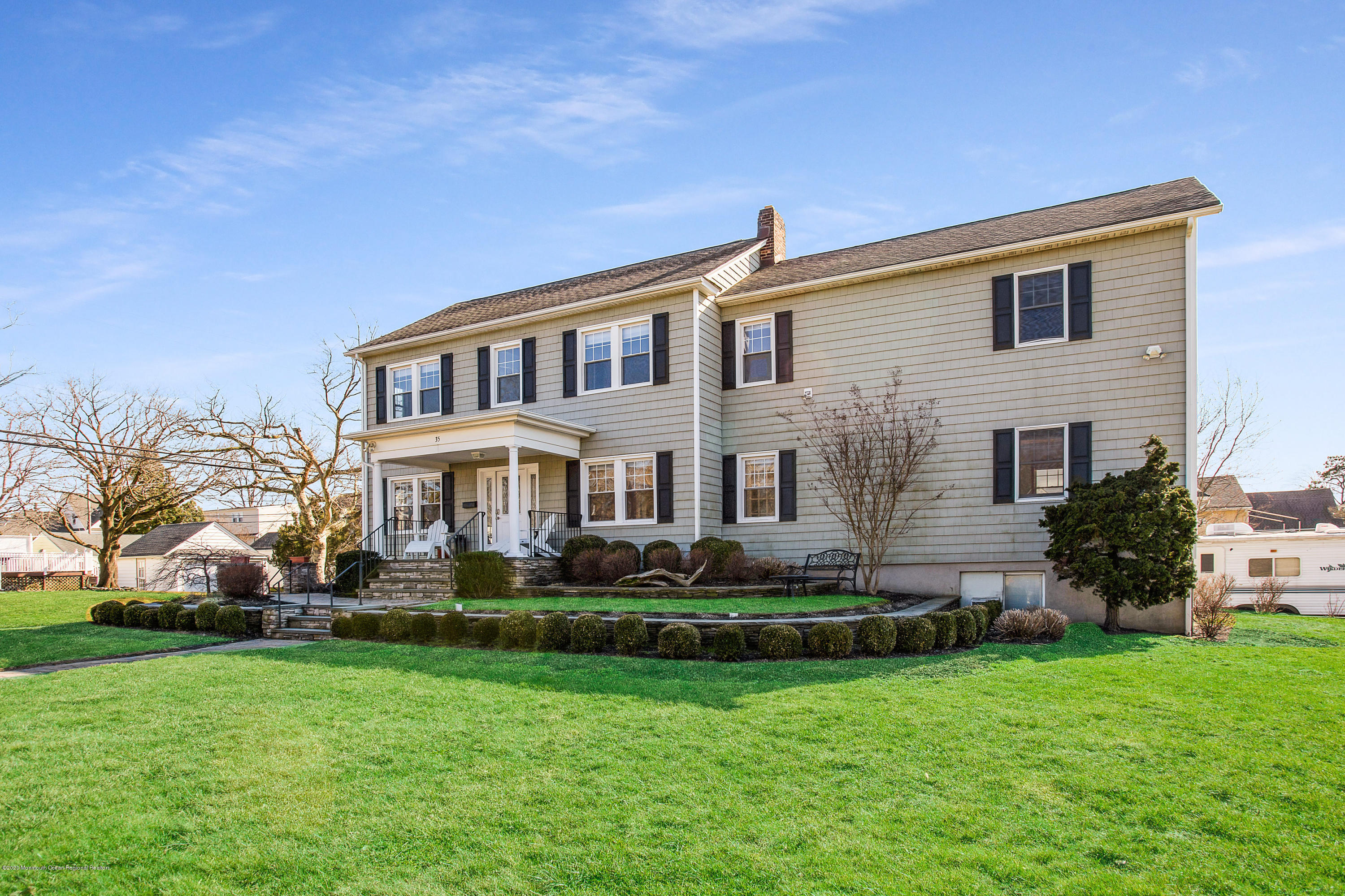 35 Boston Road Neptune City, NJ 07753 - Photo 2 of 30 a front view of a house with a garden