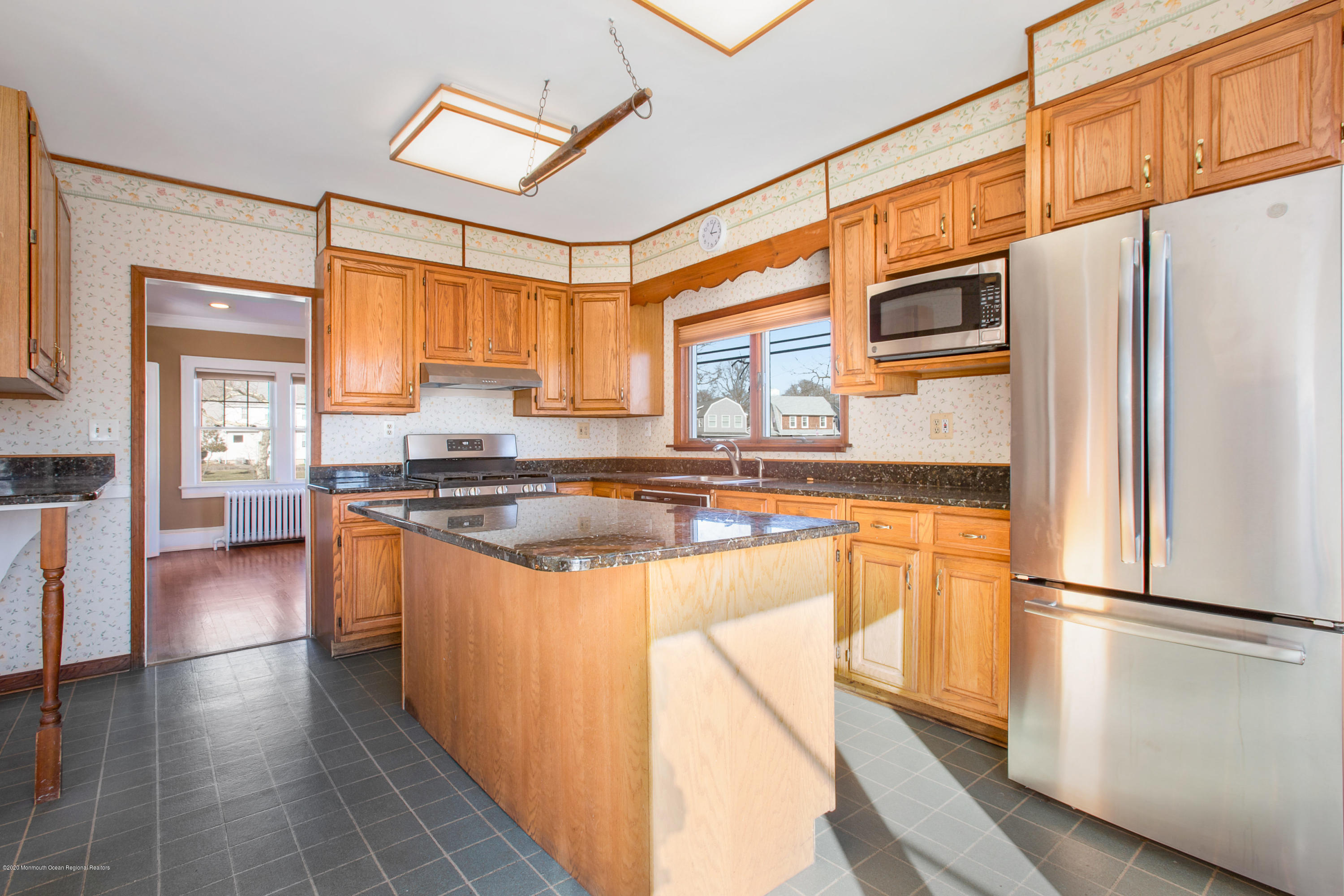 35 Boston Road Neptune City, NJ 07753 - Photo 23 of 30 a kitchen with stainless steel appliances granite countertop a refrigerator a sink and a stove