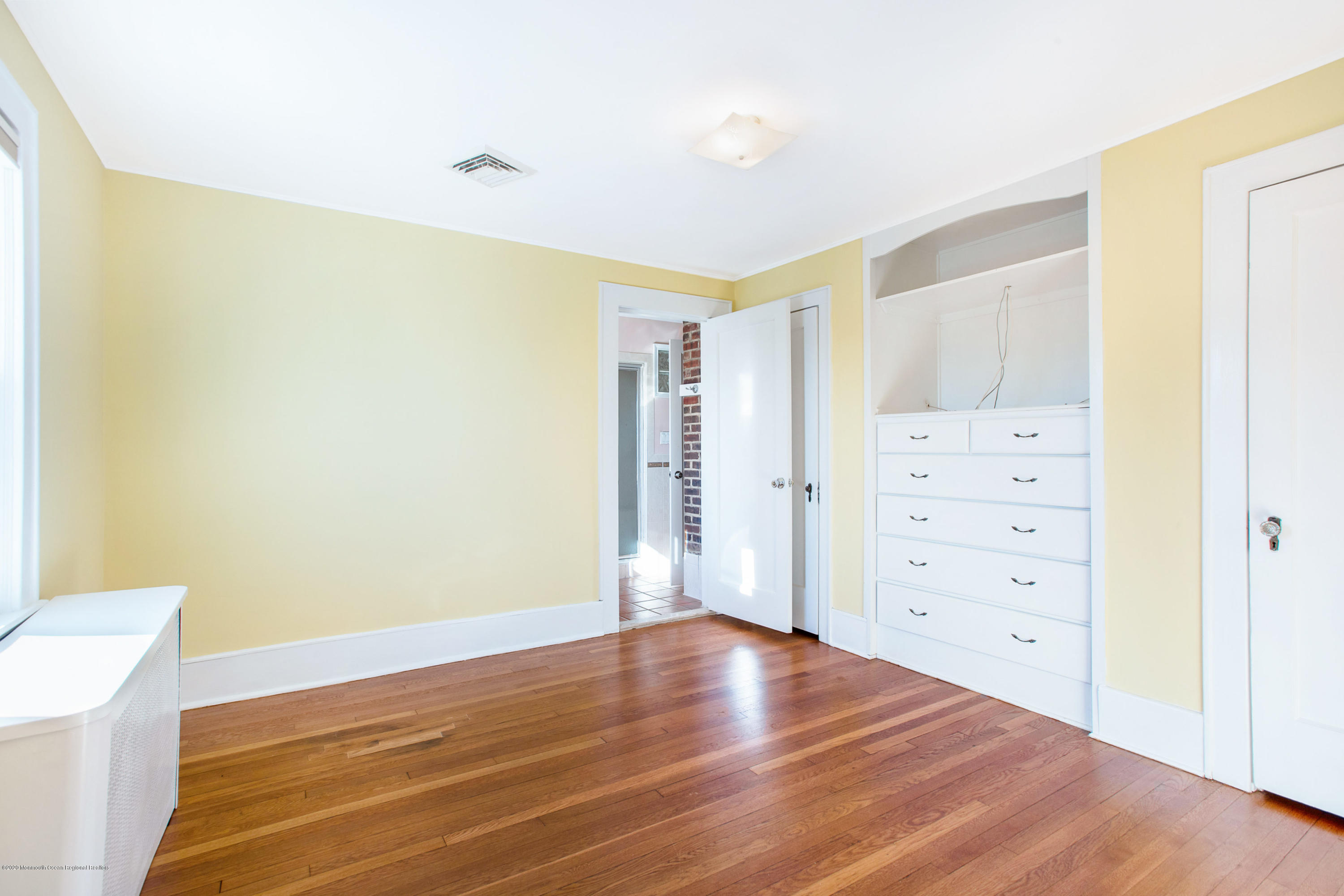 35 Boston Road Neptune City, NJ 07753 - Photo 30 of 30 a view of a room with wooden floor and bathroom