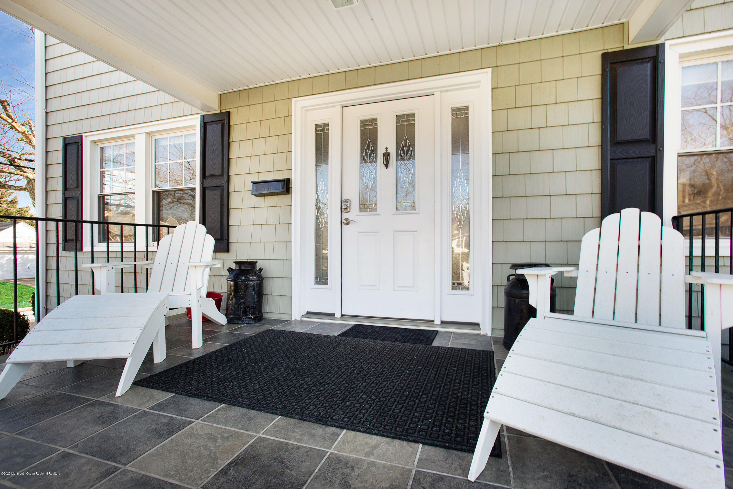 35 Boston Road Neptune City, NJ 07753 - Photo 4 of 30 a living room with a large window and furniture
