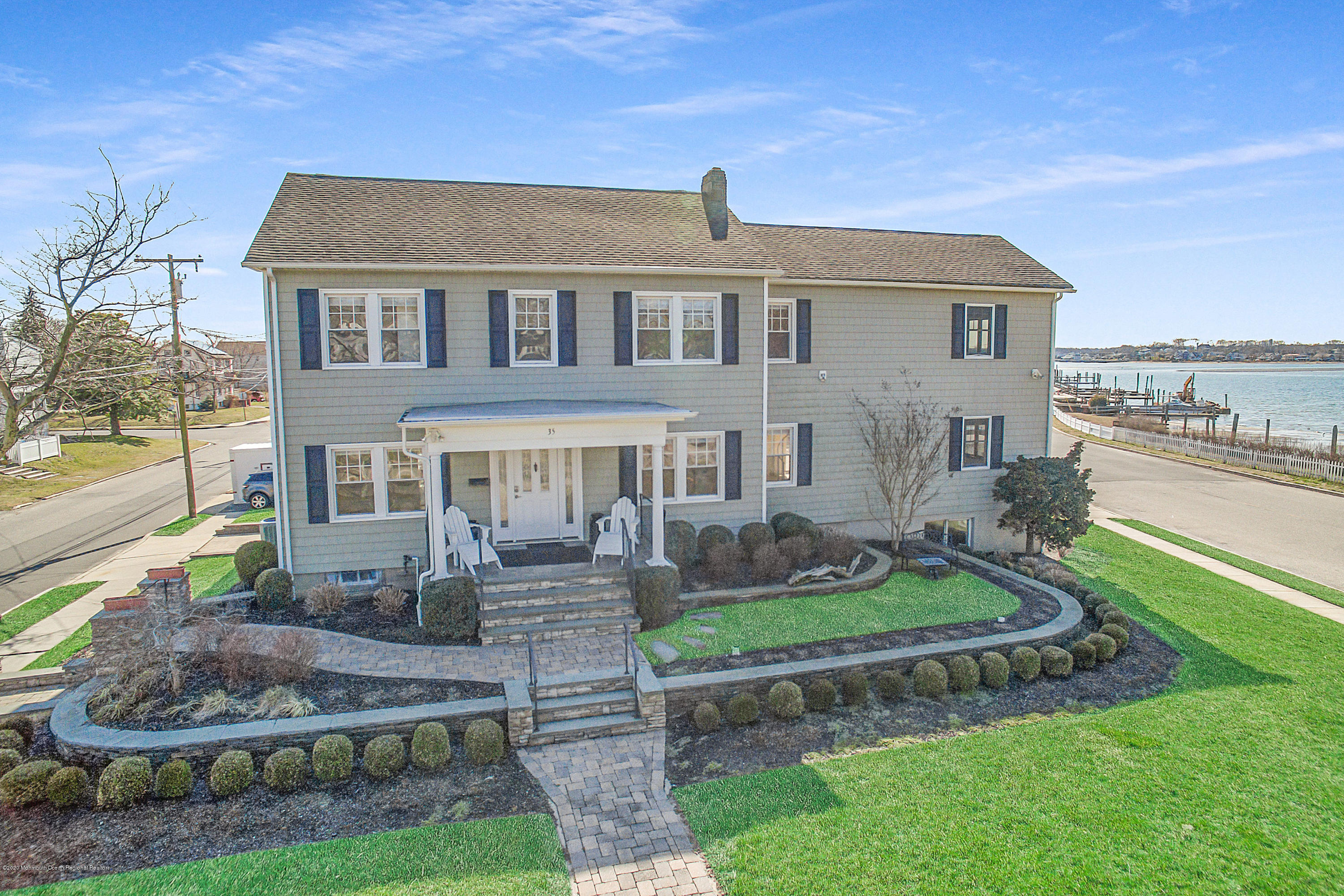 35 Boston Road Neptune City, NJ 07753 - Photo 5 of 30 a front view of a house with a yard