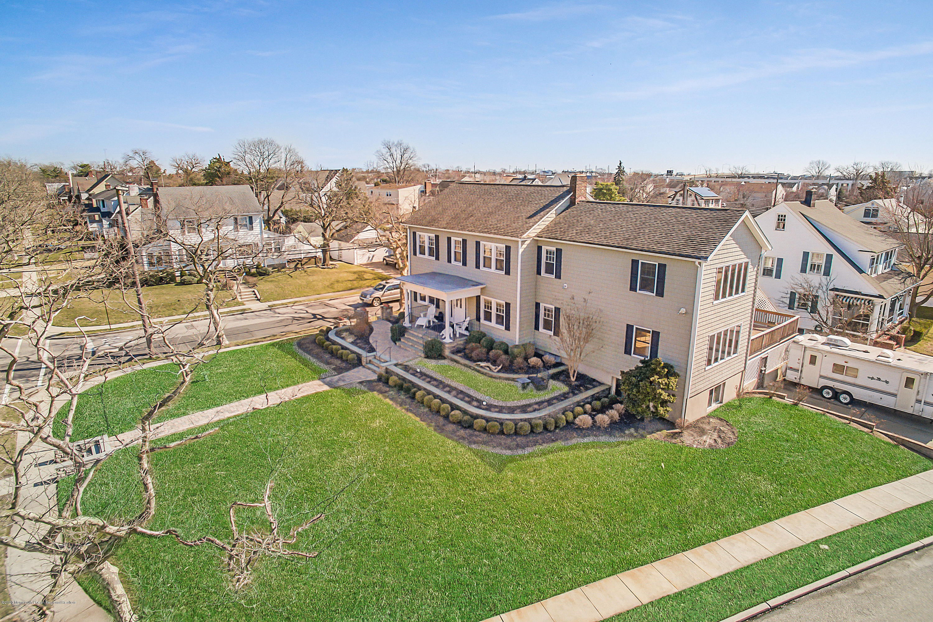 35 Boston Road Neptune City, NJ 07753 - Photo 7 of 30 a view of a house with a big yard and large trees