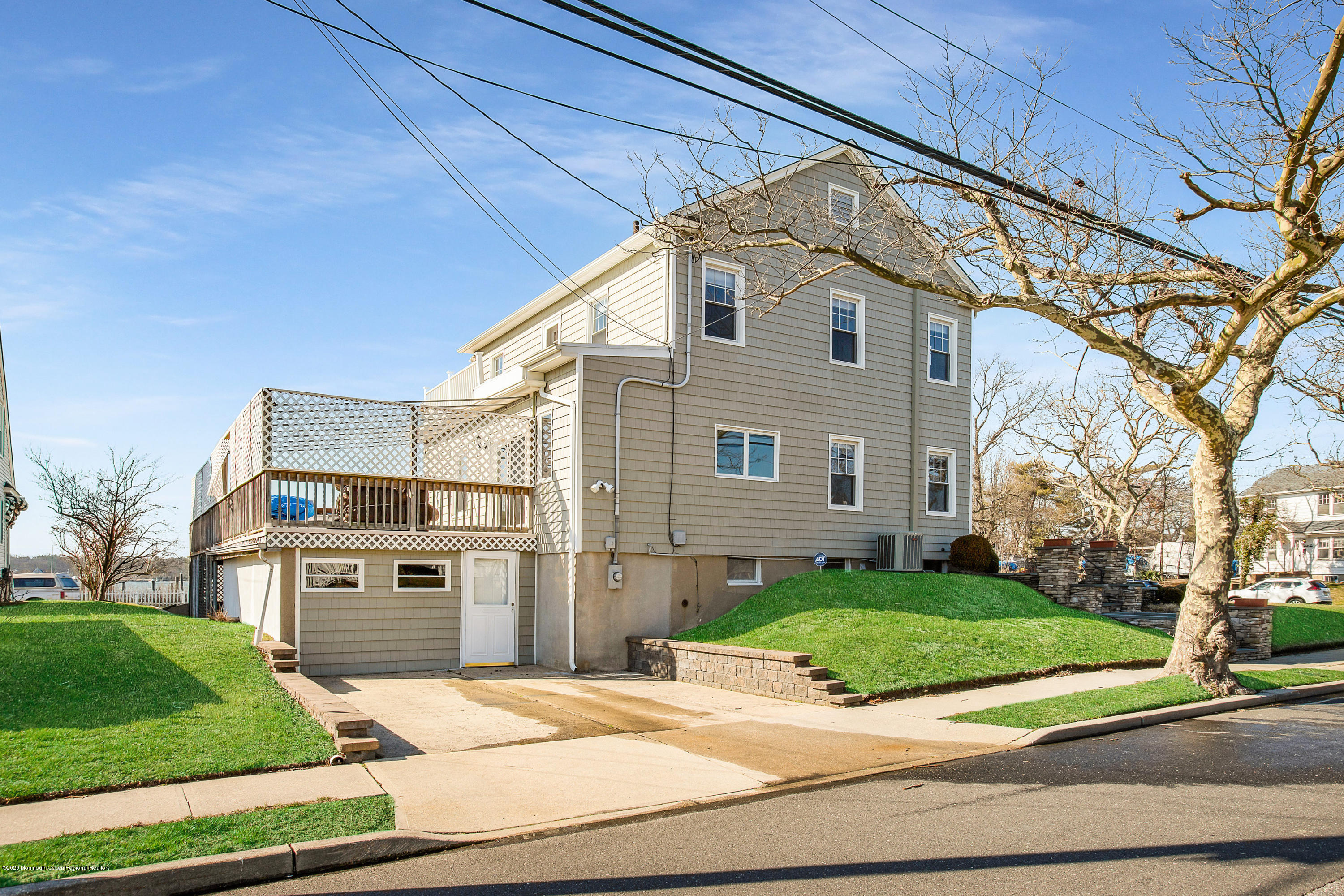 35 Boston Road Neptune City, NJ 07753 - Photo 9 of 30 a view of a white house next to a yard