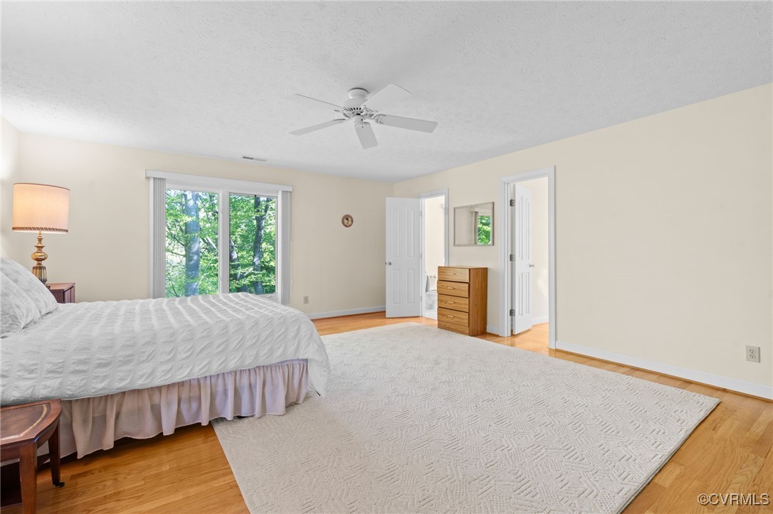 108 Conies Run Williamsburg, VA 23185 - Photo 42 of 50 a bedroom with a bed and cabinet