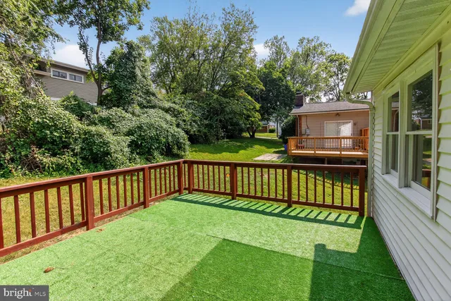 a view of a deck with a fence