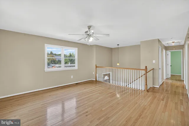 a view of a livingroom with wooden floor