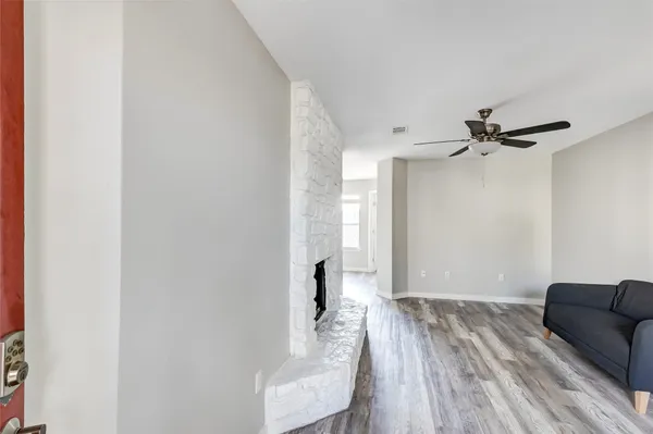 a view of livingroom with furniture and wooden floor