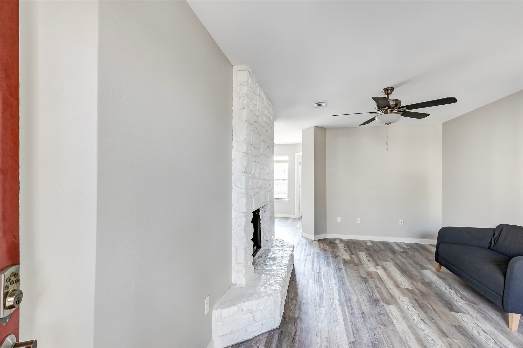 1740 Timber Ridge Road, Unit 136 Austin, TX 78741 - Photo 4 of 32 a view of livingroom with furniture and wooden floor